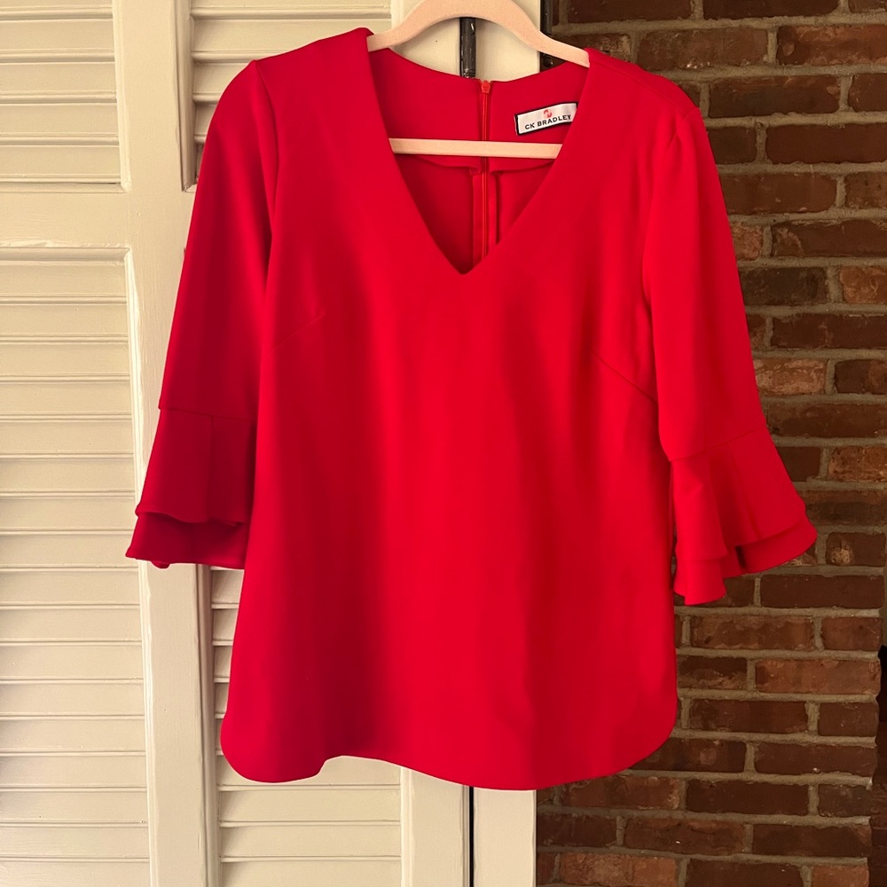 Chic Red V-Neck Blouse with Ruffled Sleeves
